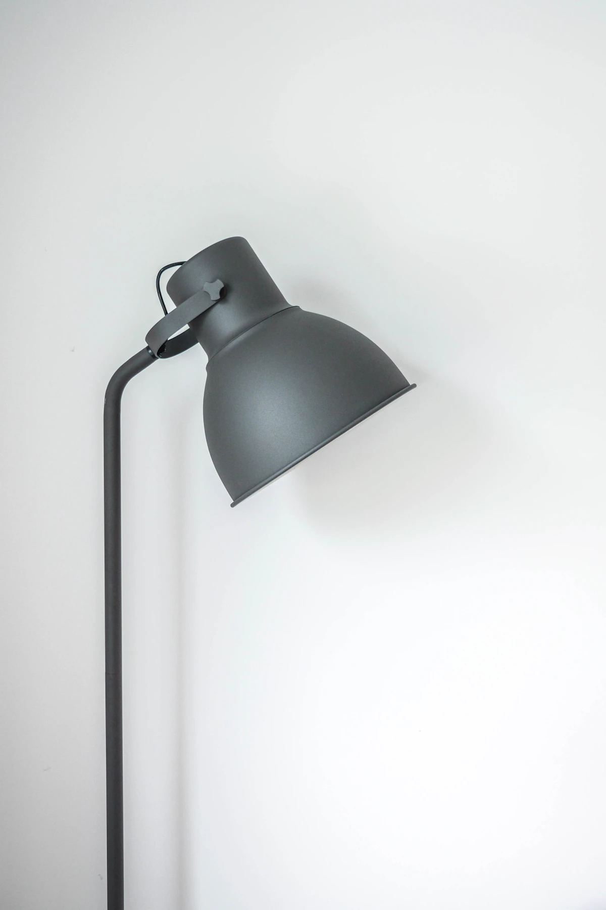 Brass table lamp with a cream drum shade